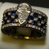 icon number one of Diamond and Sapphire Wide Band Ring item Custom73